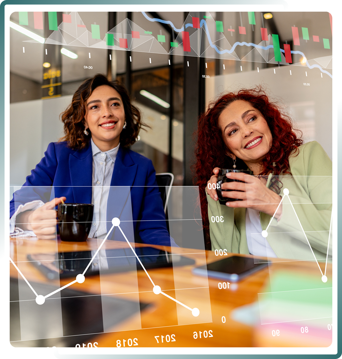 Two women discussing business, graph overlay.